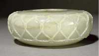 18th Century A large mottled celadon jade basket waeve compressed bowl